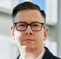 Alexander Hughes, administrerende direktør i et kryptohandelsselskab, portræt